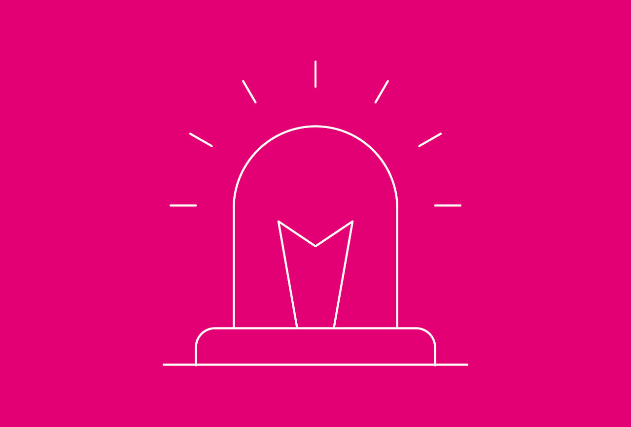 a woman and a man in a professional conversation with a lively congress in the background